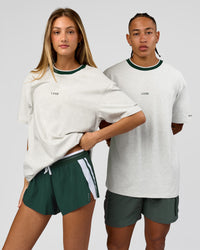 Duo wearing Be Here Now Heavyweight FLXCotton Tee Oversize - Silver Marl-Midnight Green | Model:Georgia | Size:XS | Model:Malebo | Size:M | Thumbnail Index: 0