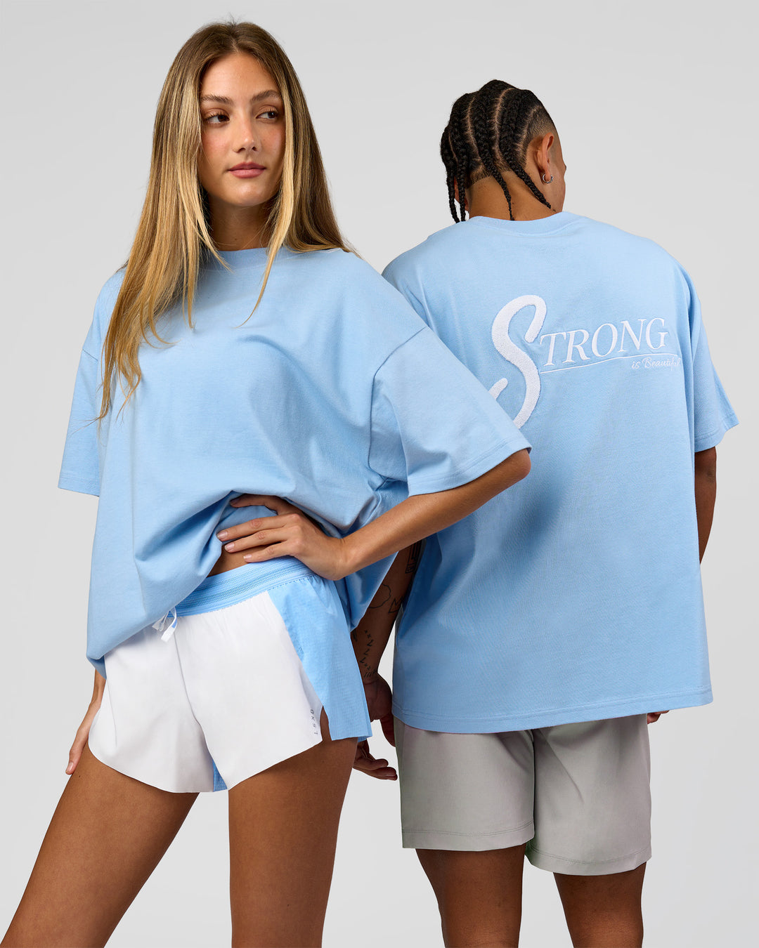 Duo wearing Strong is Beautiful Heavyweight Oversized Tee - Open Air | Model:Georgia | Size:XS | Model:Malebo | Size:M - view 1