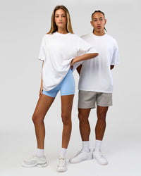 Duo wearing Strong is Beautiful Heavyweight Oversized Tee - White | Model:Georgia | Size:XS | Model:Malebo | Size:M | Thumbnail Index: 1