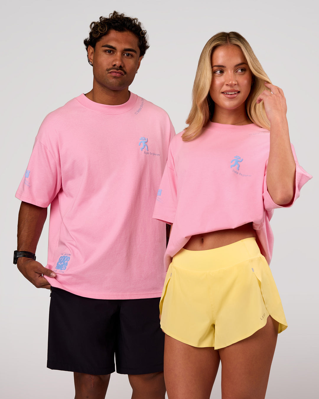 Duo wearing Values Manifesto Heavyweight Oversized Tee  - Pink Rose-Open Air | Model:Issy | Size:XS | Model:Xav | Size:L - view 1