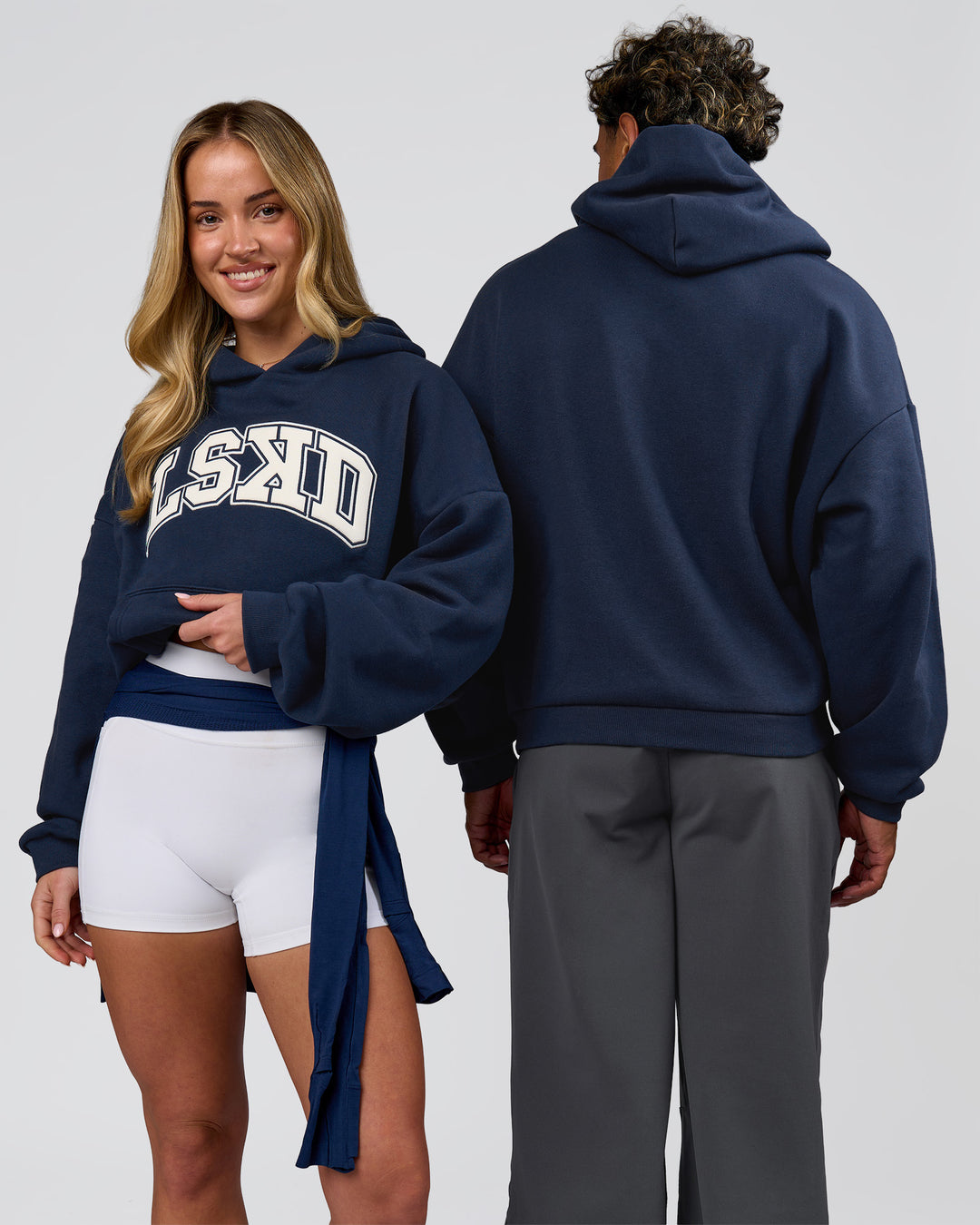 Duo wearing Varsity Boxy Hoodie - Future Navy-White | Model:Issy | Size:XS | Model:Xav | Size:L - view 11