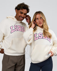 Duo wearing Varsity Boxy Hoodie - Off White-Pink Rose | Model:Issy | Size:XS | Model:Xav | Size:L | Thumbnail Index: 0