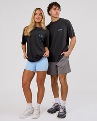 Duo wearing Blended FLXCotton Oversize Tee  - Black Washed | Model:Issy | Size:XS | Model:Leandro | Size:M | Thumbnail Index: 3
