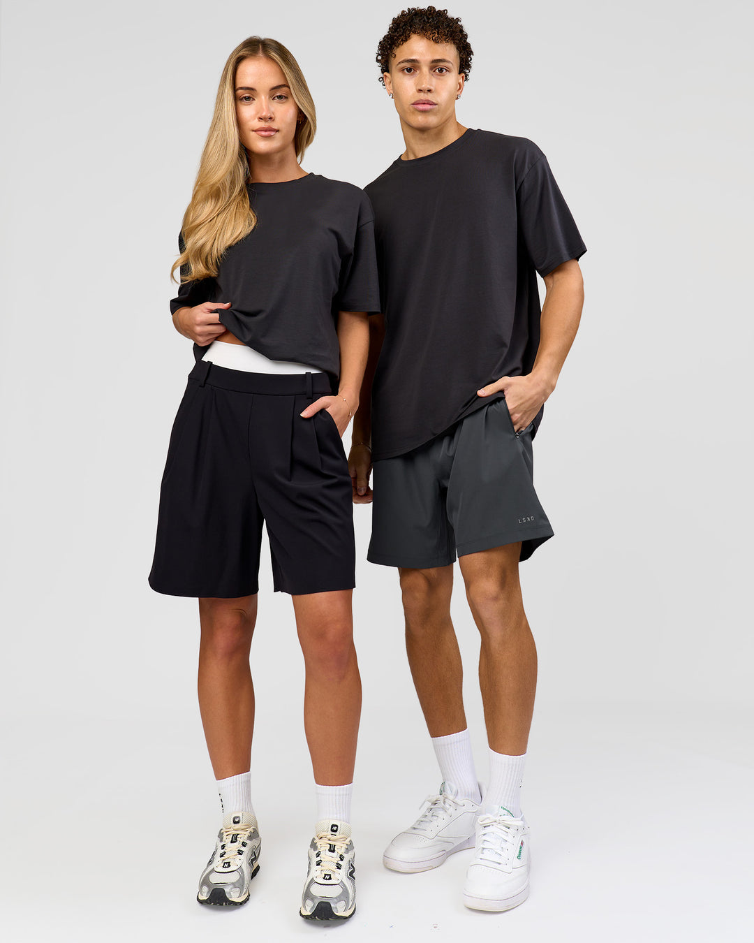 Duo wearing Benchmark FLXCotton Oversized Tee - Onyx-Yellow Fizz | Model:Issy | Size:XS | Model:Leandro | Size:M - view 4
