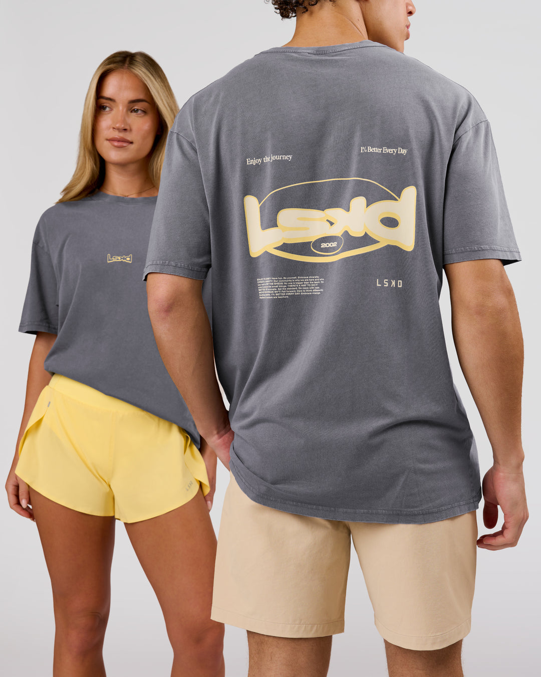 Duo wearing Magma FLXCotton Oversize Tee  - Dark Storm Washed-Lemon | Model:Issy | Size:XS | Model:Leandro | Size:M - view 1