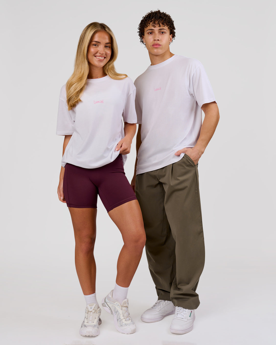 Duo wearing Magma FLXCotton Oversize Tee  - White-Pink Rose | Model:Issy | Size:XS | Model:Leandro | Size:M - view 7