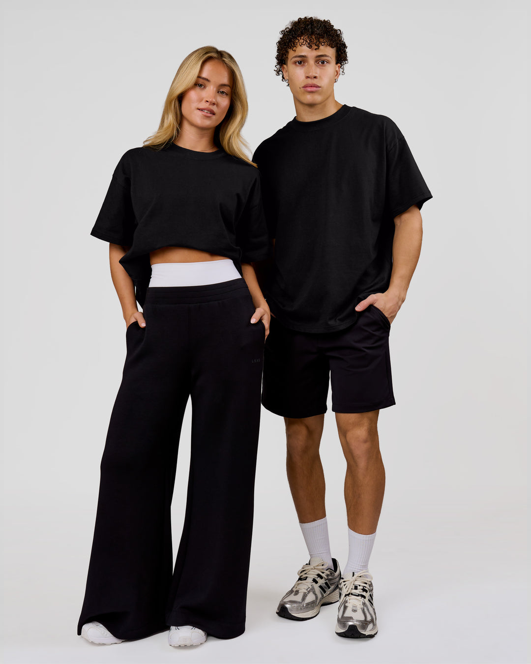 Duo wearing Shadow Mark Heavyweight Oversized Tee - Black-Onyx | Model:Issy | Size:XS | Model:Leandro | Size:M - view 4
