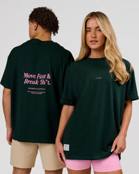 Duo wearing VS26 MFBS FLXCotton Oversize Tee - Midnight Green-Pink Rose | Model:Issy | Size:XS | Model:Leandro | Size:M | Thumbnail Index: 0