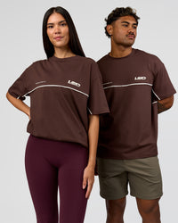 Duo wearing Inline Heavyweight FLXCotton Oversized Tee - Hot Chocolate-Off White | Model:Rhiley | Size:XS | Model:Xav | Size:L | Thumbnail Index: 4