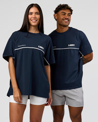 Duo wearing Inline Heavyweight FLXCotton Oversized Tee - Midnight Navy-White | Model:Rhiley | Size:XS | Model:Xav | Size:L | Thumbnail Index: 7