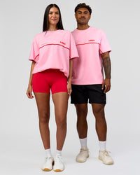Duo wearing Inline Heavyweight FLXCotton Oversized Tee - Pink Rose-Flame | Model:Rhiley | Size:XS | Model:Xav | Size:L | Thumbnail Index: 6