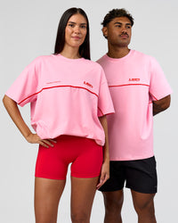Duo wearing Inline Heavyweight FLXCotton Oversized Tee - Pink Rose-Flame | Model:Rhiley | Size:XS | Model:Xav | Size:L | Thumbnail Index: 9