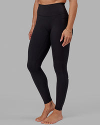 Woman wearing O.G. Fusion Ultra High-Rise Tall Legging Pockets - Black | Model:Bree | Size:S | Thumbnail Index: 4