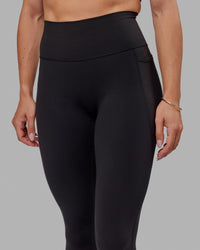 Woman wearing O.G. Fusion Ultra High-Rise Tall Legging Pockets - Black | Model:Bree | Size:S | Thumbnail Index: 2