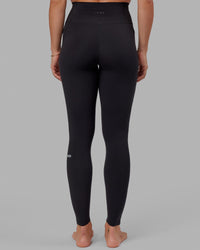 Woman wearing O.G. Fusion Ultra High-Rise Tall Legging Pockets - Black | Model:Bree | Size:S | Thumbnail Index: 7