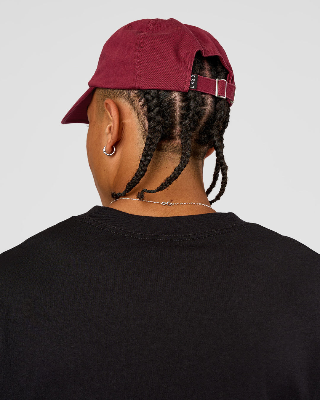 Man wearing All Day Cap - Cherry Lacquer | Model:Day | Size:ALL - view 2
