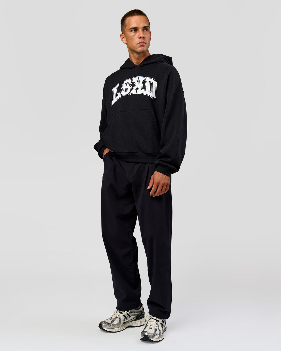 Man wearing Varsity Boxy Hoodie - Caviar-White | Model:Albert | Size:L - view 13