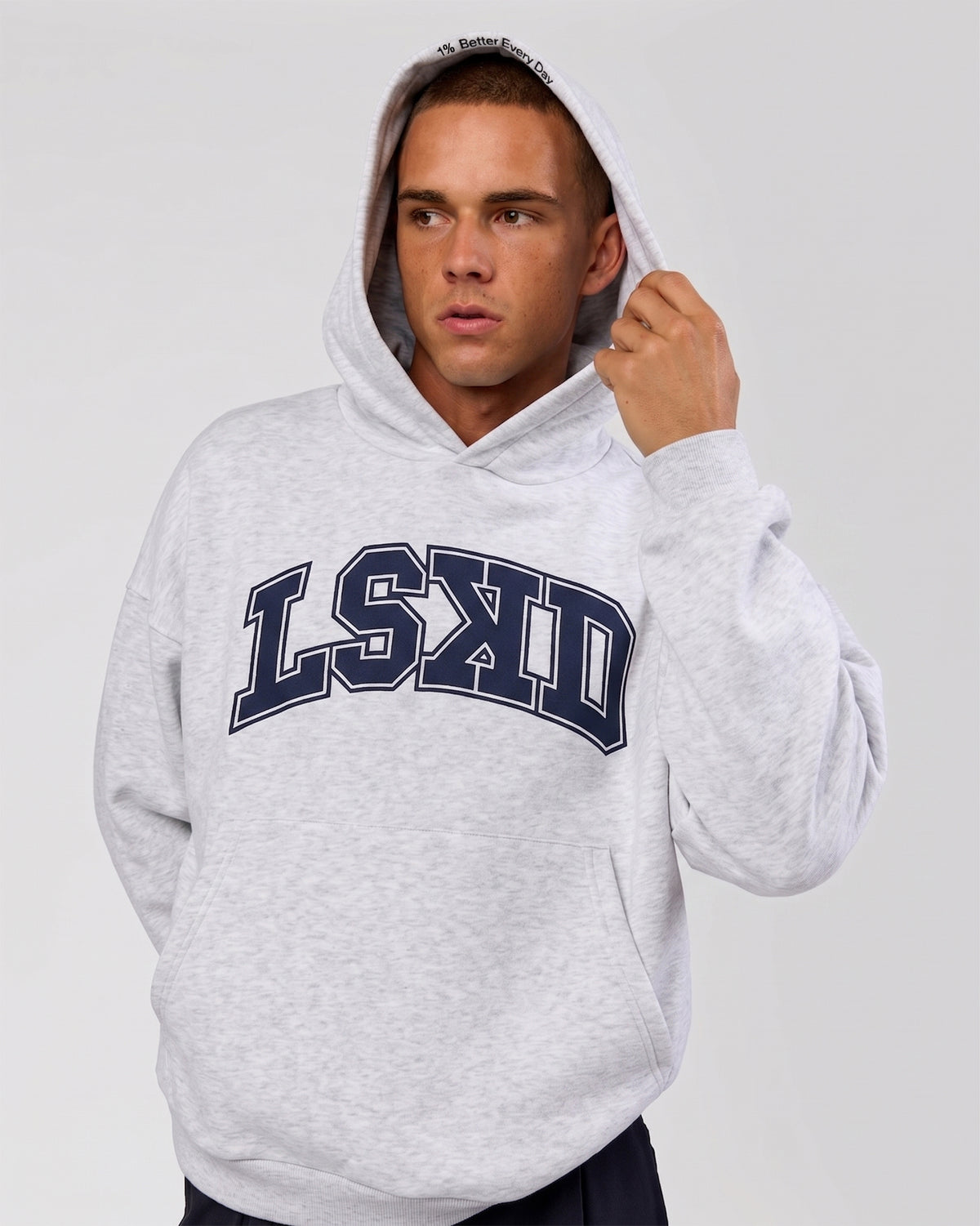 Man wearing Varsity Boxy Hoodie - Silver Marl-Future Navy | Model:Albert | Size:L