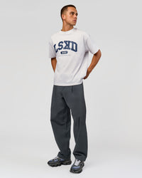 Man wearing Varsity EST Heavyweight Oversized Tee  - Silver Marl-Future Navy | Model:Albert | Size:L | Thumbnail Index: 3
