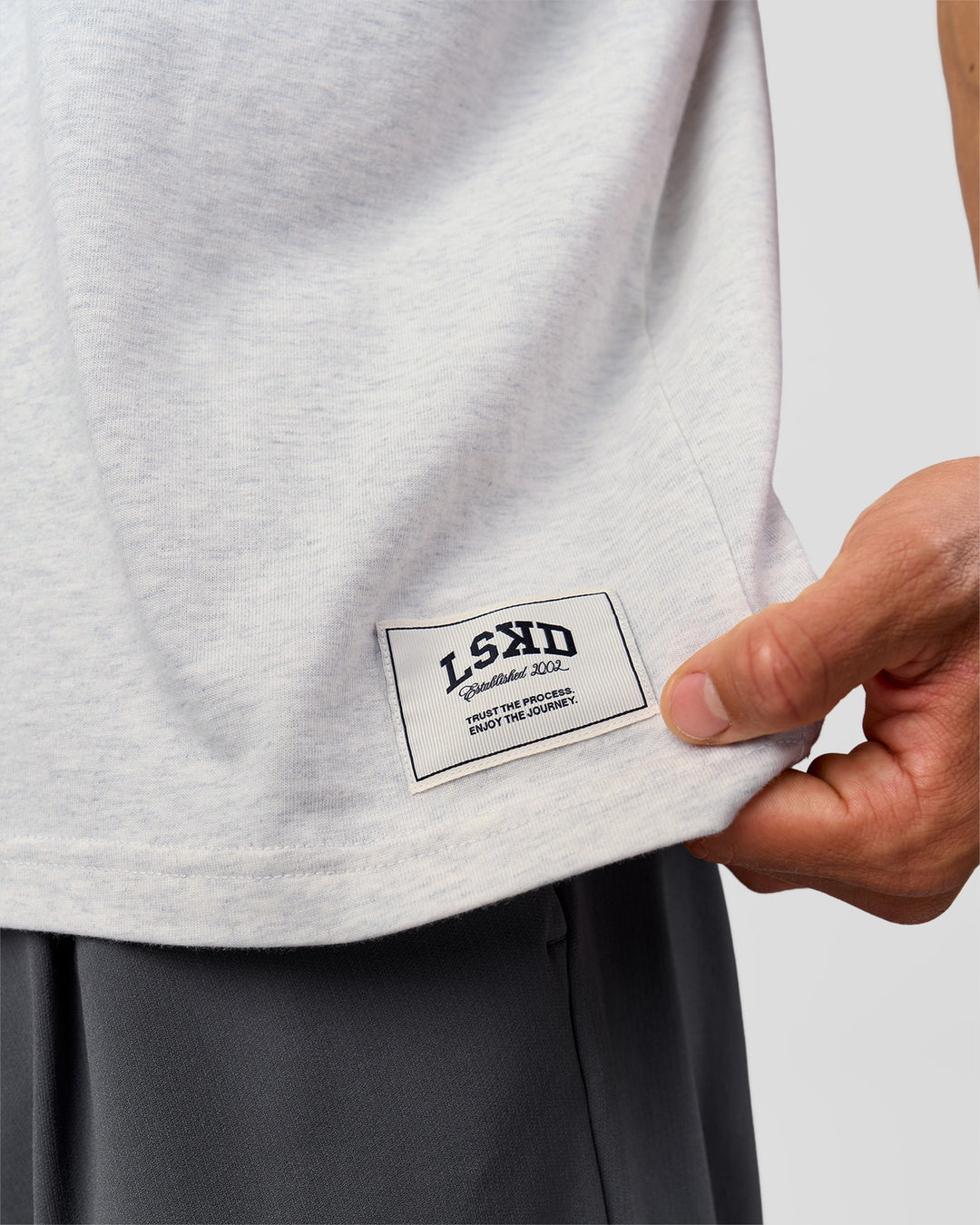 Man wearing Varsity EST Heavyweight Oversized Tee  - Silver Marl-Future Navy | Model:Albert | Size:L - view 6