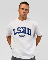 Man wearing Varsity EST Heavyweight Oversized Tee  - Silver Marl-Future Navy | Model:Albert | Size:L | Thumbnail Index: 10