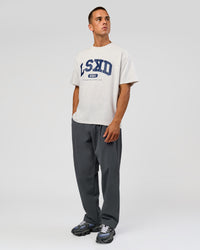 Man wearing Varsity EST Heavyweight Oversized Tee  - Silver Marl-Future Navy | Model:Albert | Size:L | Thumbnail Index: 14
