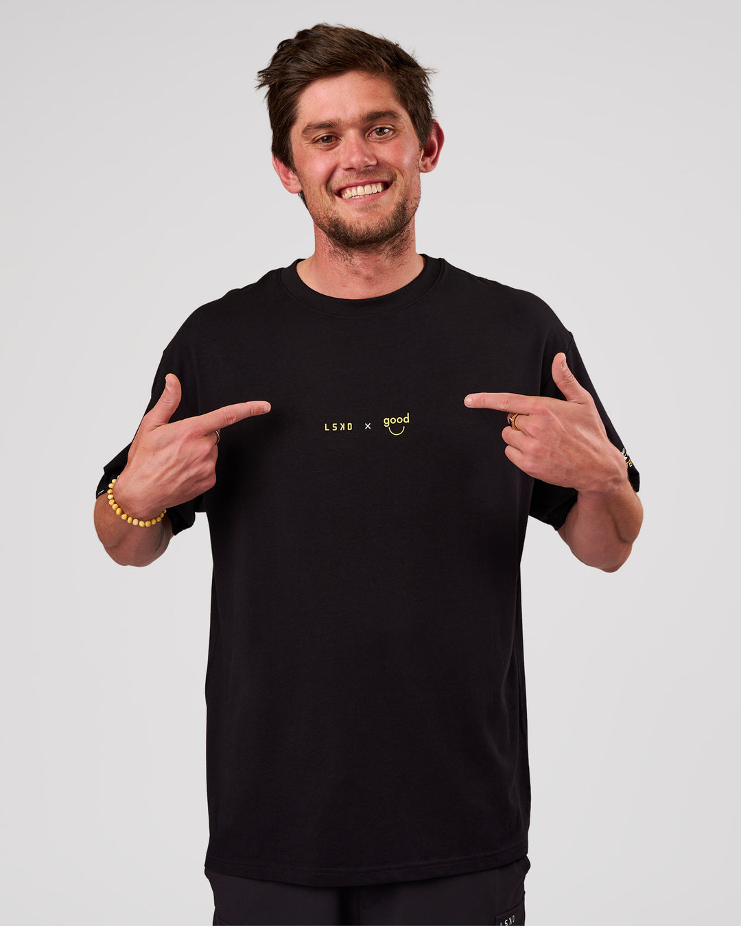 Man wearing TGHF X LSKD 26 FLXCotton Oversized Tee - Black | Model:Cooper | Size:L - view 3