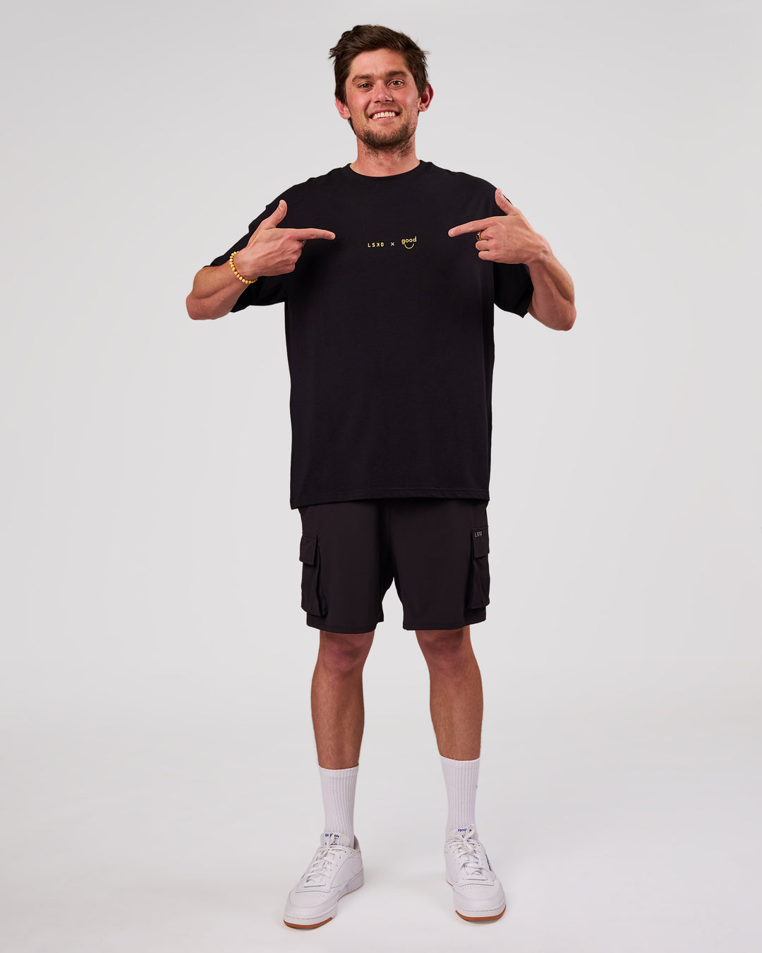 Man wearing TGHF X LSKD 26 FLXCotton Oversized Tee - Black | Model:Cooper | Size:L - view 11
