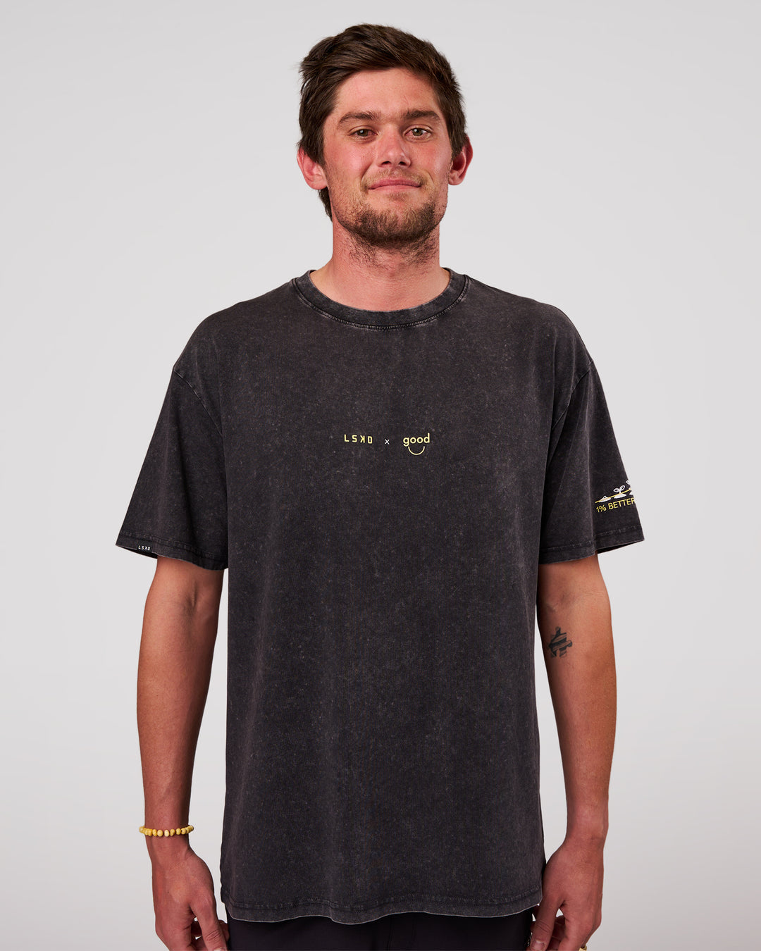 Man wearing TGHF X LSKD 26 FLXCotton Oversized Tee - Black Washed | Model:Cooper | Size:L - view 3