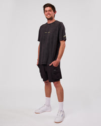 Man wearing TGHF X LSKD 26 FLXCotton Oversized Tee - Black Washed | Model:Cooper | Size:L | Thumbnail Index: 6