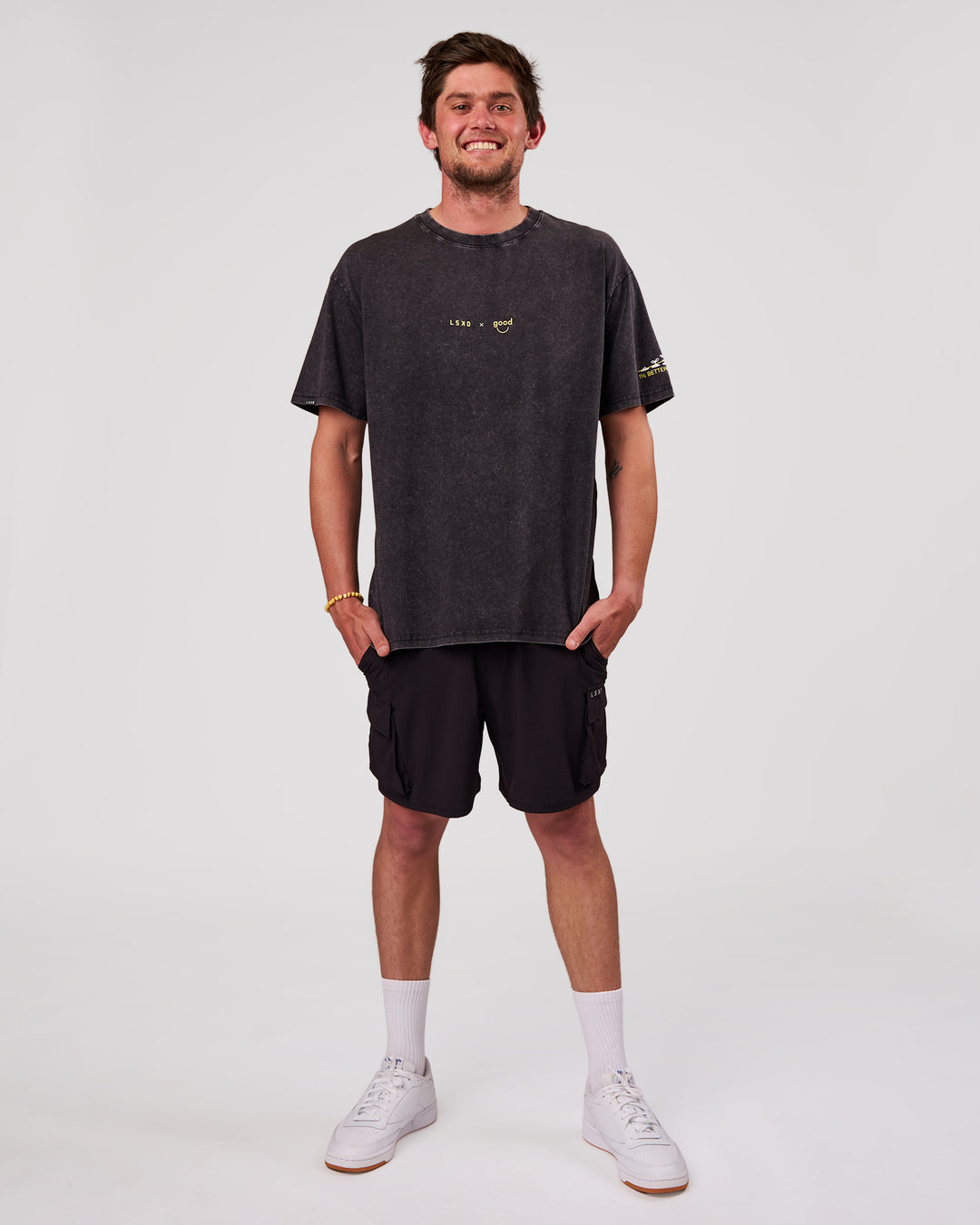 Man wearing TGHF X LSKD 26 FLXCotton Oversized Tee - Black Washed | Model:Cooper | Size:L - view 8
