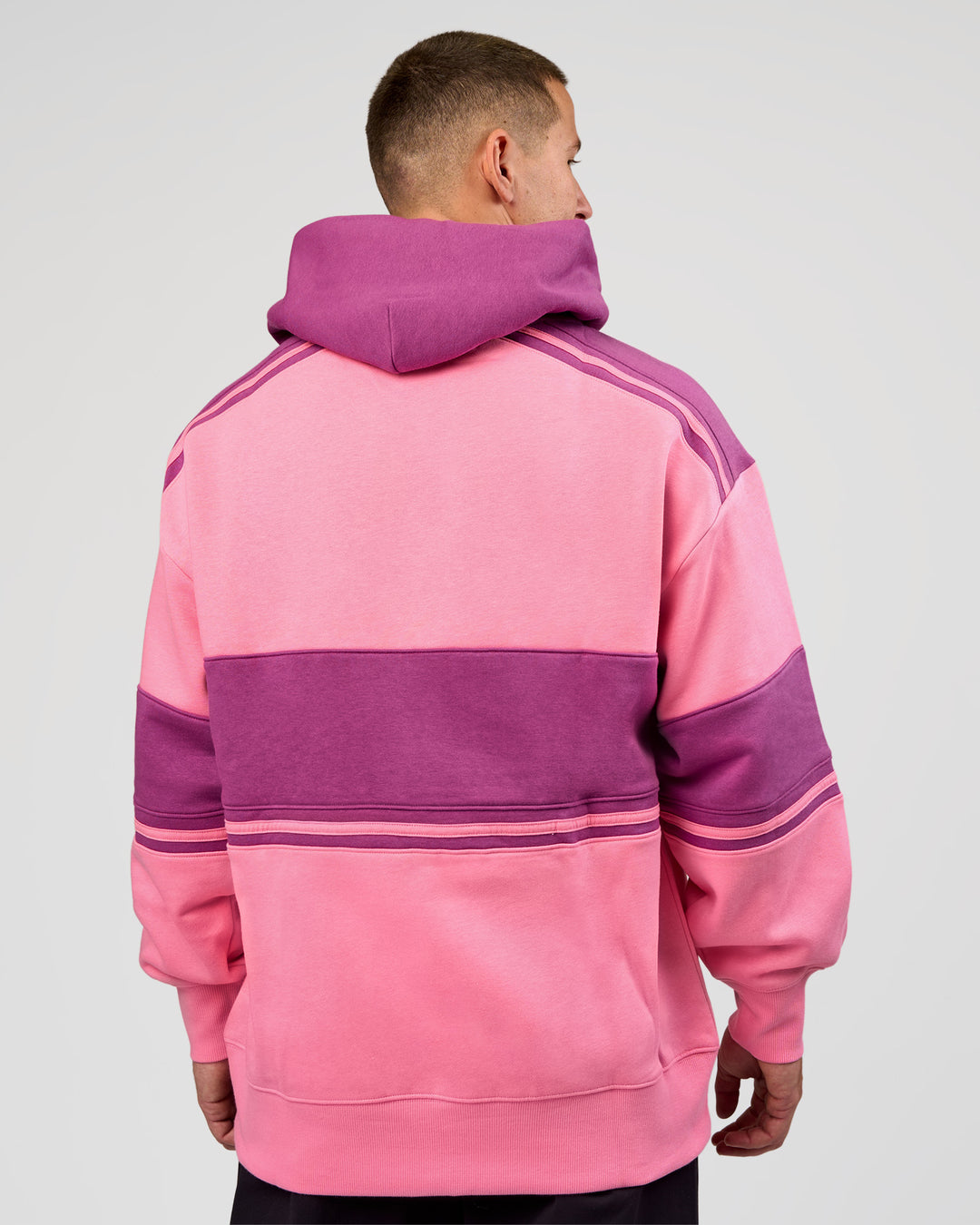 Man wearing A-Team Oversized Hoodie - Candy Pink-Boysenberry | Model:Jaiden | Size:L - view 4