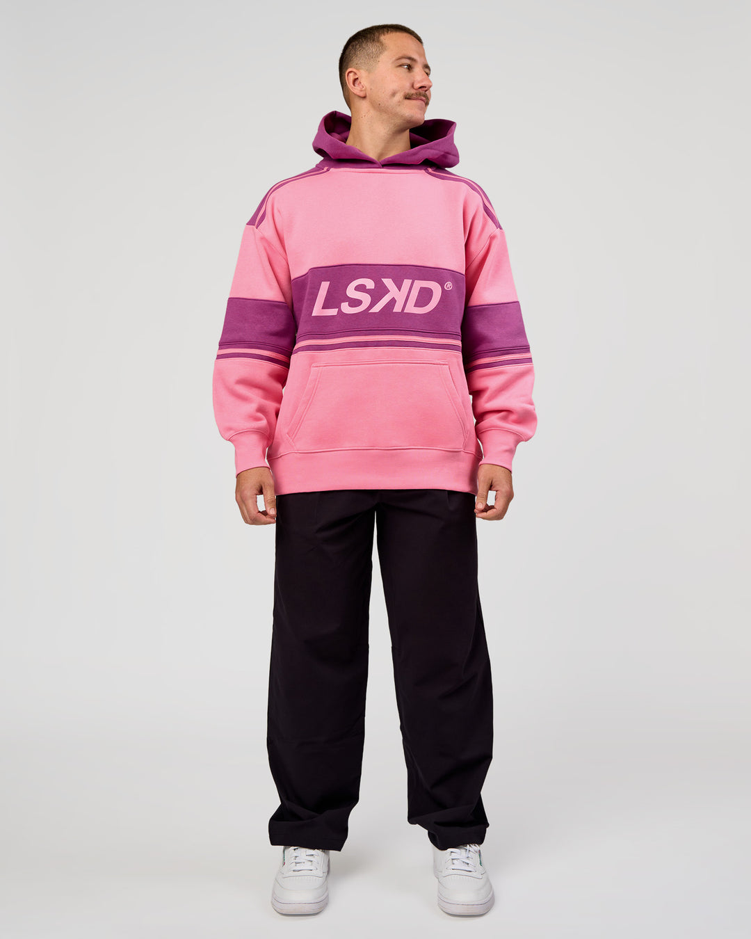 Man wearing A-Team Oversized Hoodie - Candy Pink-Boysenberry | Model:Jaiden | Size:L - view 8