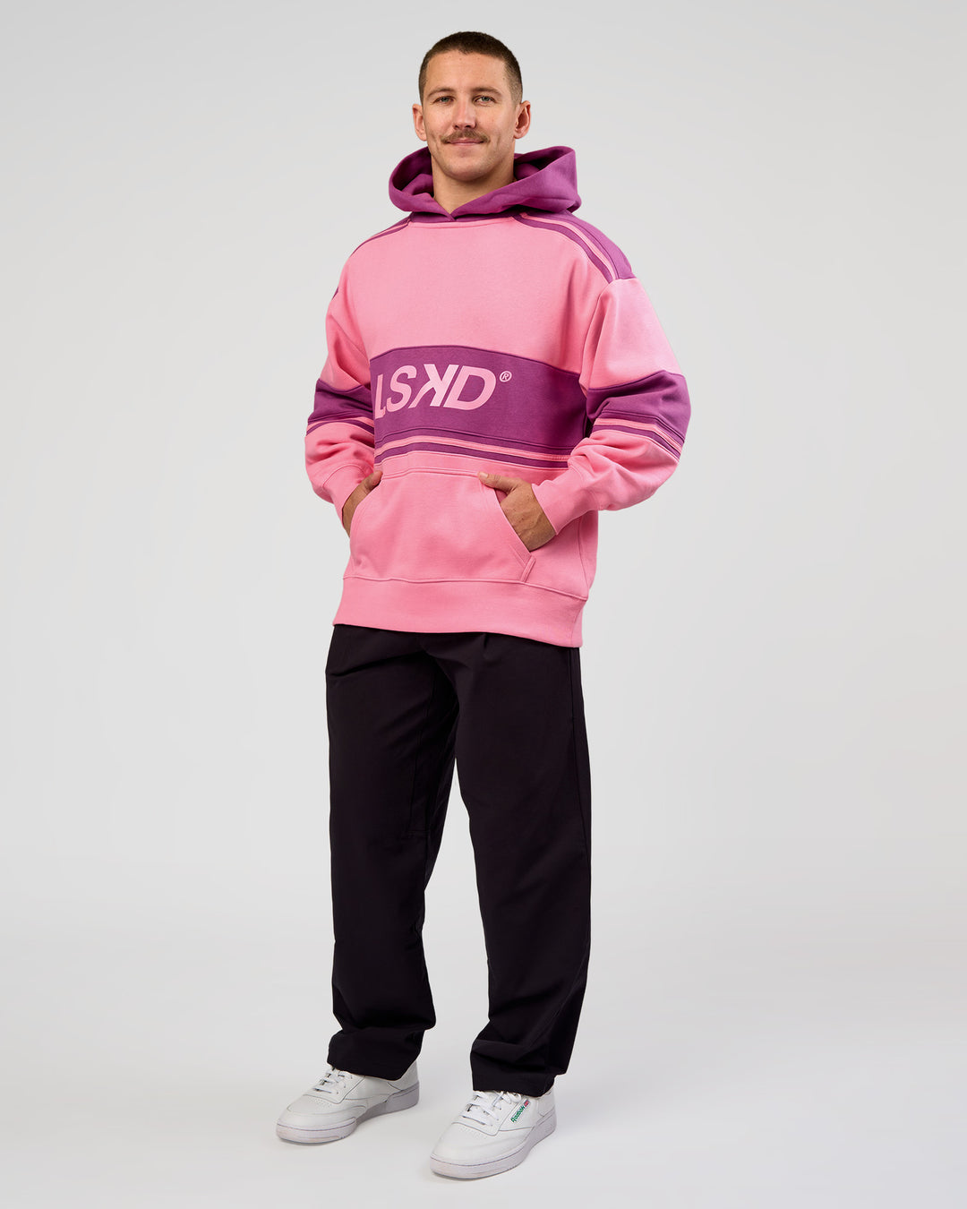 Man wearing A-Team Oversized Hoodie - Candy Pink-Boysenberry | Model:Jaiden | Size:L - view 10