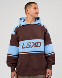 Man wearing A-Team Oversized Hoodie - Hot Chocolate-Open Air | Model:Jaiden | Size:L | Thumbnail Index: 1