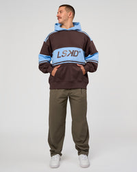 Man wearing A-Team Oversized Hoodie - Hot Chocolate-Open Air | Model:Jaiden | Size:L | Thumbnail Index: 3