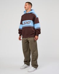 Man wearing A-Team Oversized Hoodie - Hot Chocolate-Open Air | Model:Jaiden | Size:L | Thumbnail Index: 8