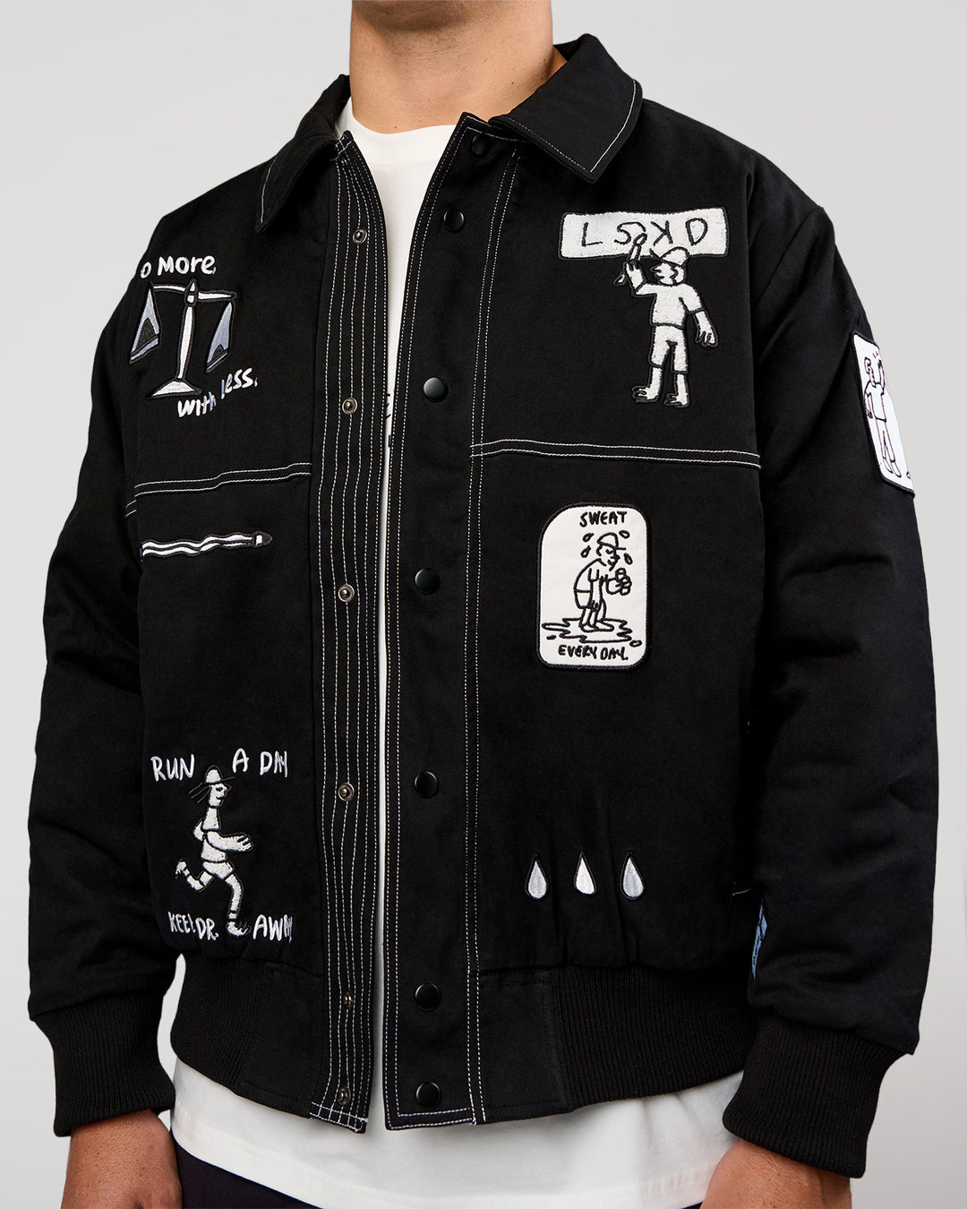 Man wearing Andrew J. Steel x LSKD Bomber Jacket - Black | Model:Jaiden | Size:L - view 3