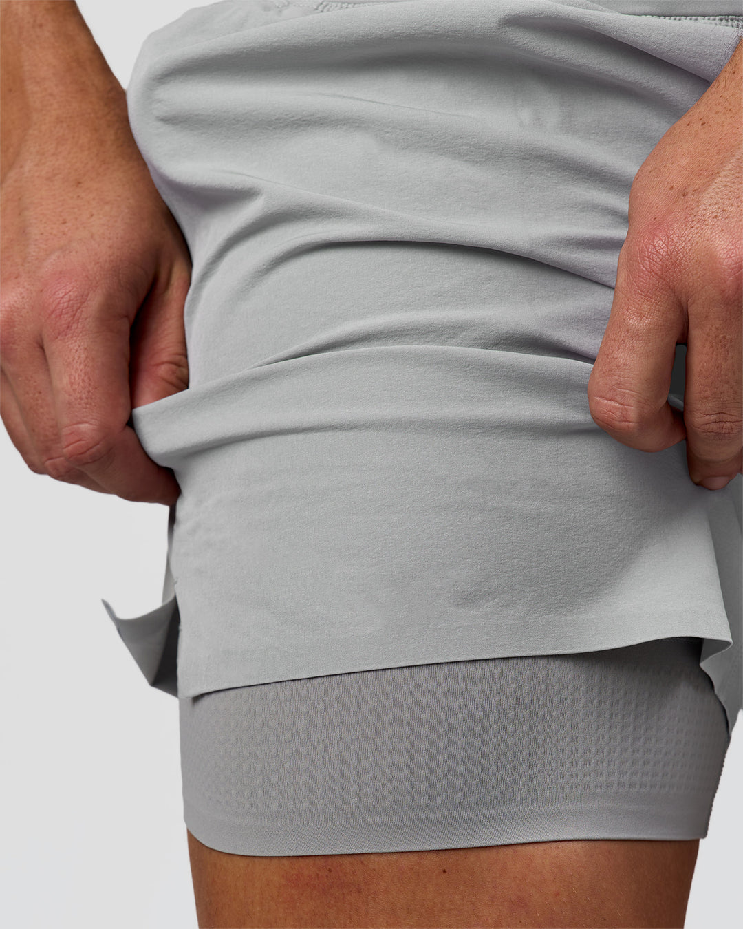 Man wearing Hybrid Lined 5" Short - Alloy | Model:Jaiden | Size:L - view 11