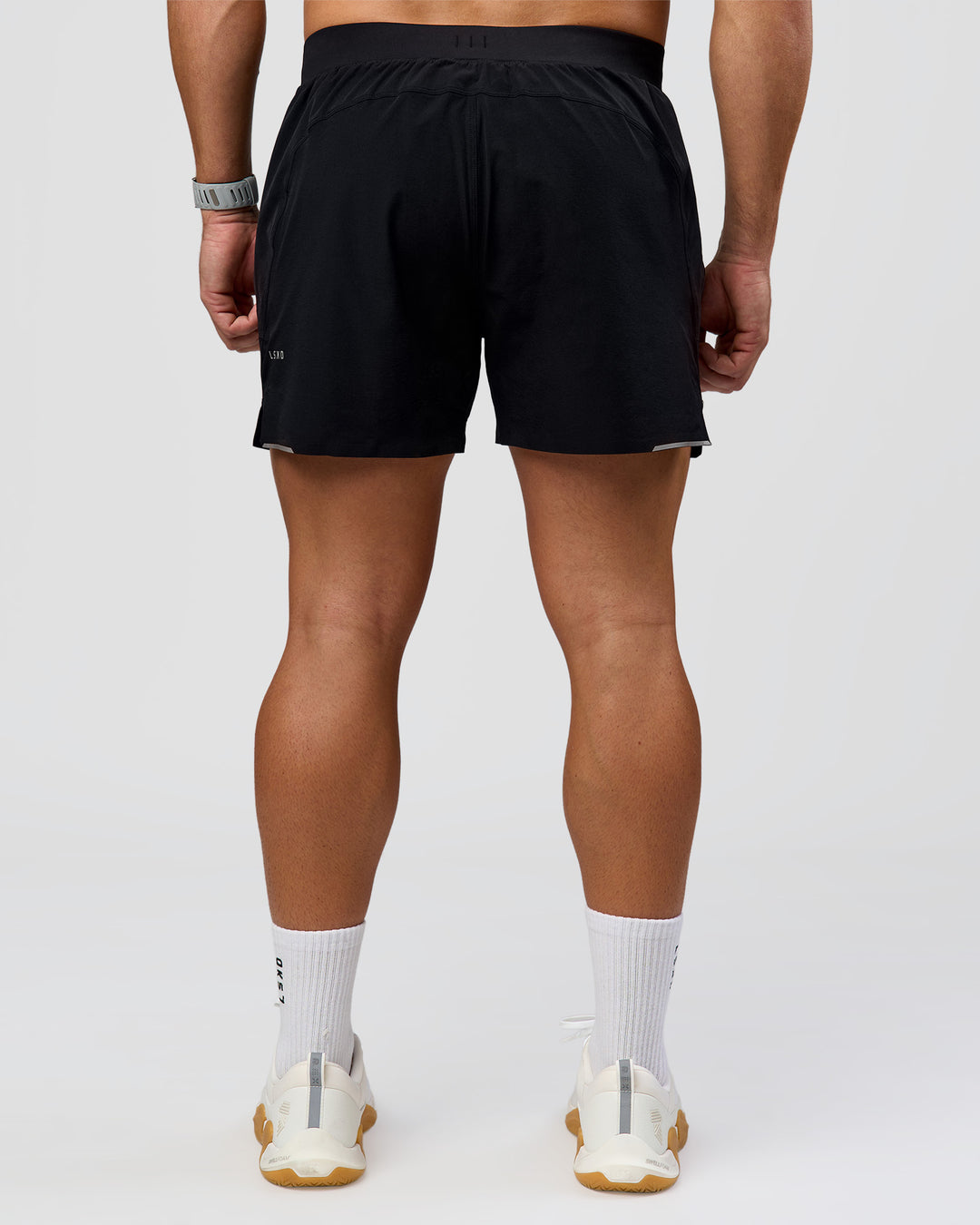 Man wearing Hybrid Lined 5" Short - Black-Reflective | Model:Jaiden | Size:L - view 5