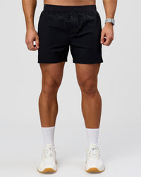 Man wearing Hybrid Lined 5" Short - Black-Reflective | Model:Jaiden | Size:L | Thumbnail Index: 5