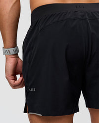 Man wearing Hybrid Lined 5" Short - Black-Reflective | Model:Jaiden | Size:L | Thumbnail Index: 9