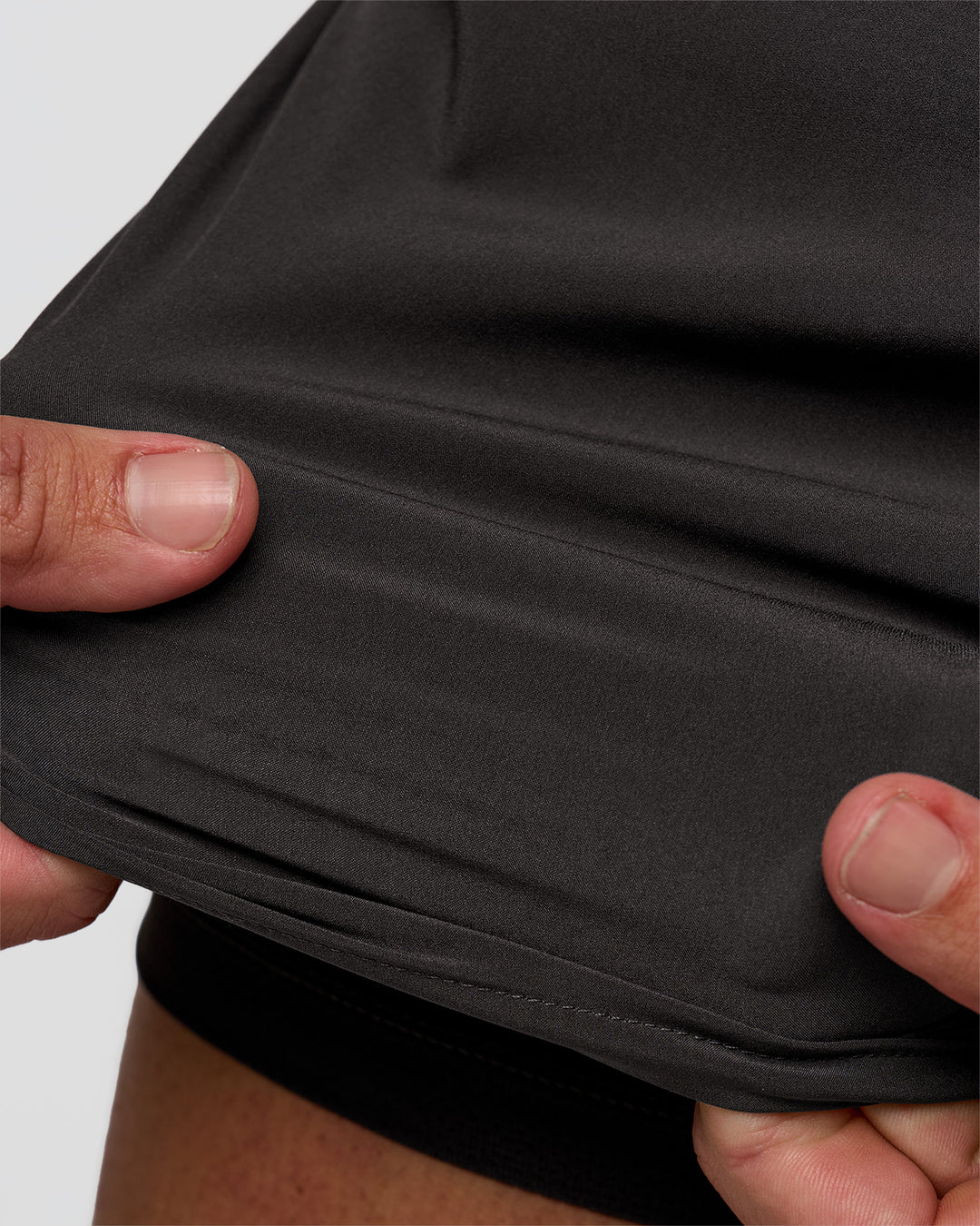 Man wearing Pace 5" Lined Running Short - Black-Onyx | Model:Jaiden | Size:L - view 7