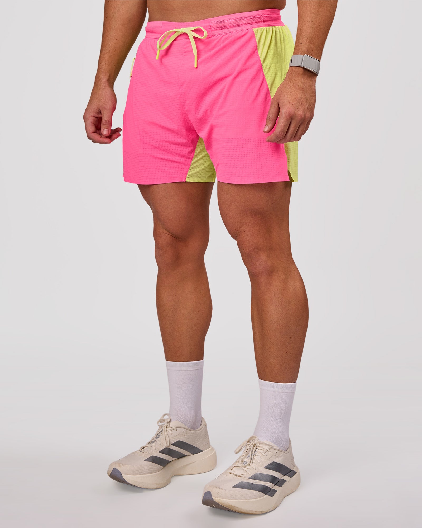 Man wearing UltraAir 5" Lined Performance Short - Sugar Plum-Lime Glo | Model:Jaiden | Size:L
