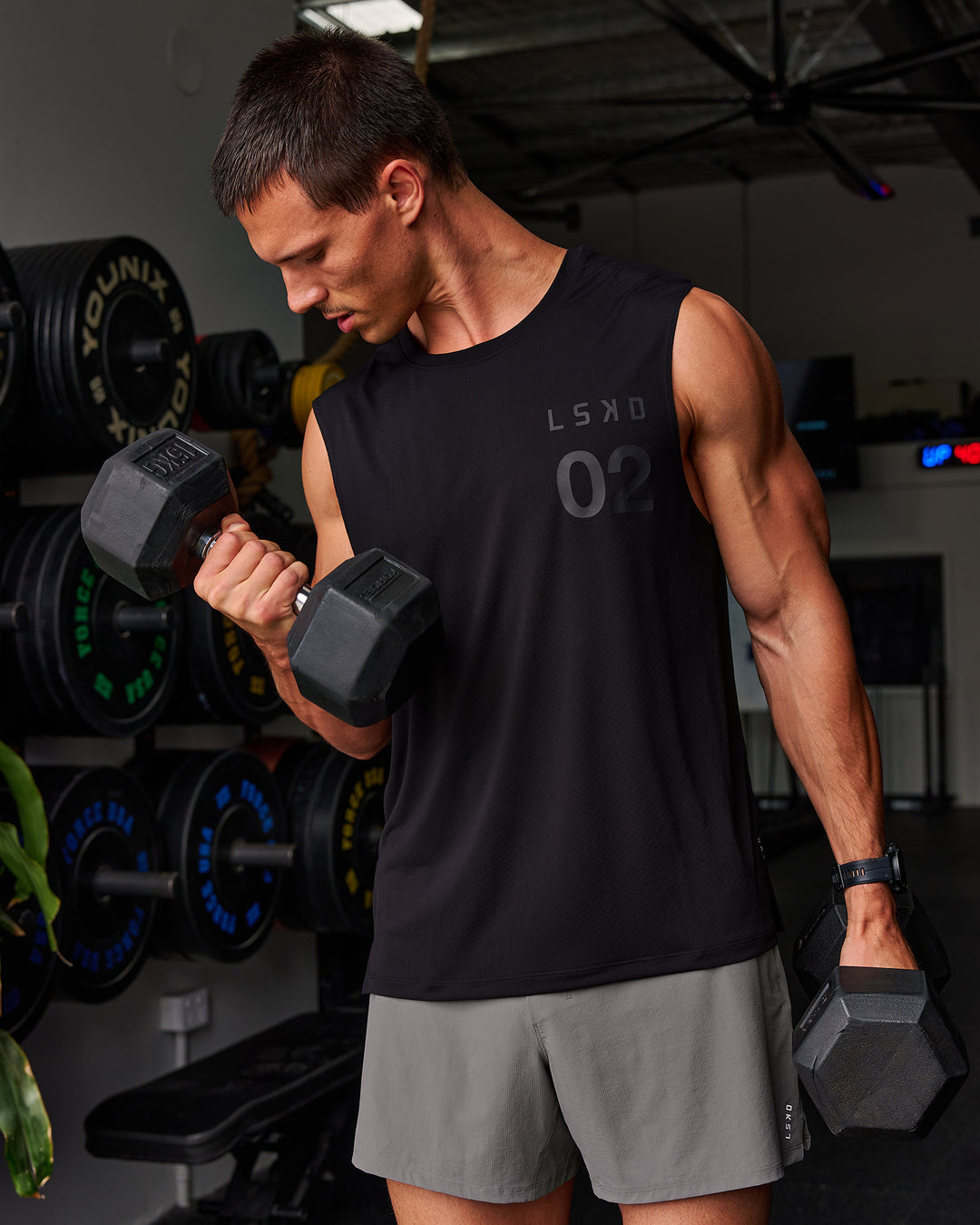 Man wearing Game Plan Rep Muscle Training Tank - Black-Onyx | Model:Liam | Size:L - view 1