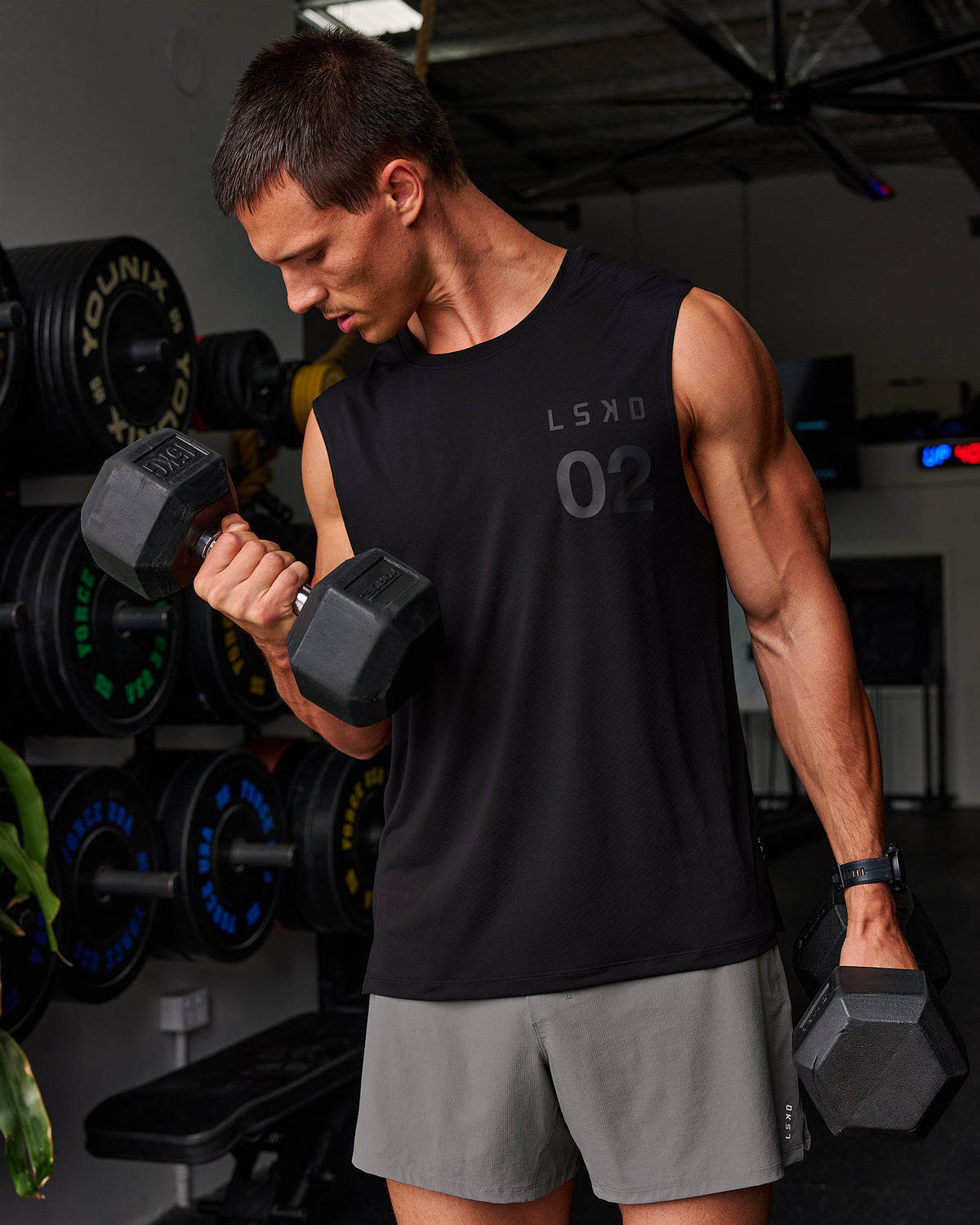 Man wearing Game Plan Rep Muscle Training Tank - Black-Onyx | Model:Liam | Size:L - view 1