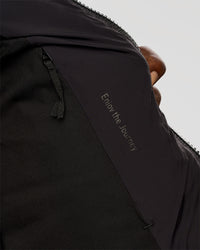 Man wearing Base Puffer Vest - Black | Model:Okello | Size:L | Thumbnail Index: 5