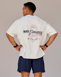 Man wearing Greatest of All Time Heavyweight FLXCotton Oversized Tee - Off White Washed-Scarlet | Model:Shane | Size:L | Thumbnail Index: 2