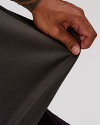 Man wearing AfterDark ZeroCrease Oversized Tee - Onyx | Model:Xav | Size:L | Thumbnail Index: 4