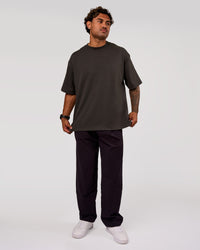 Man wearing AfterDark ZeroCrease Oversized Tee - Onyx | Model:Xav | Size:L | Thumbnail Index: 5